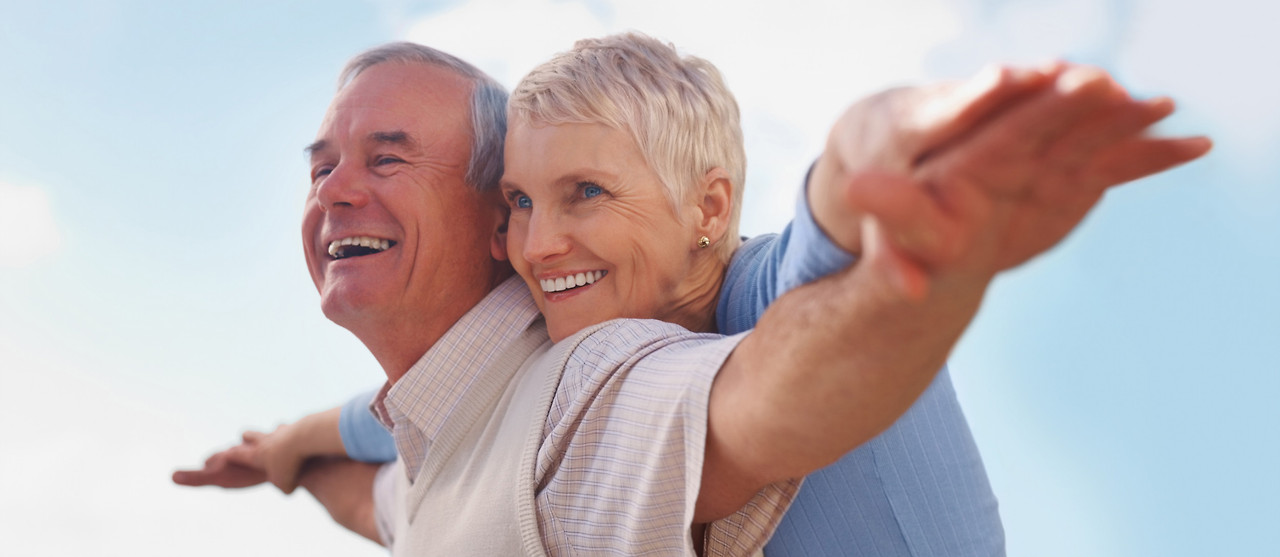 Cropped_Happy_Senior_Couple_Stretching_63618851.jpg