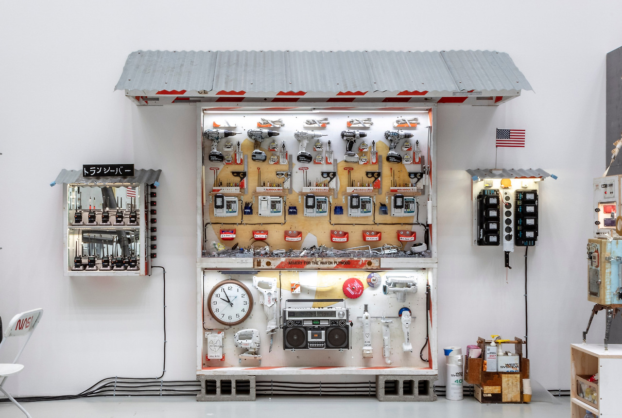 8 Armory For the War on Plywood (AFWOP) Tool Wall , 2012, ConEd barrier, plywood, latex paint, steel hardware, mixed media.jpg