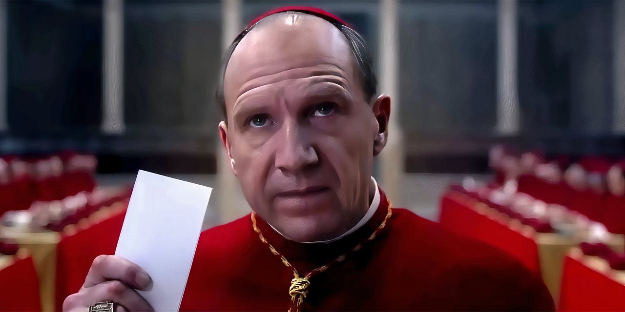ralph-fiennes-as-thomas-cardinal-lawrence-holding-up-a-piece-of-paper-and-looking-contemplative-in-conclave.jpg