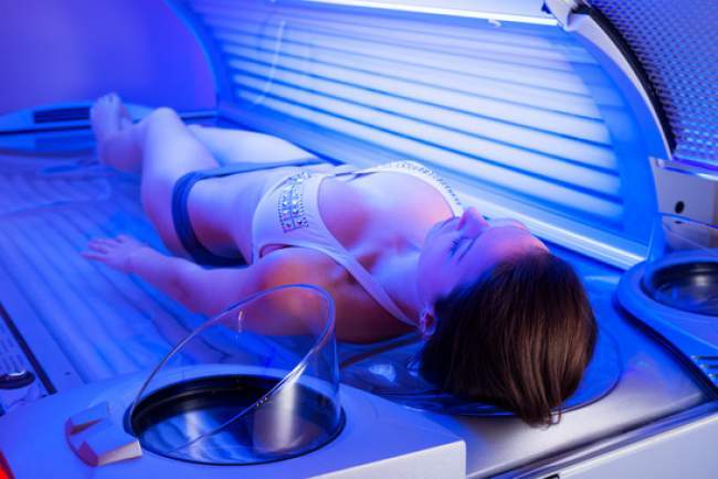 Woman-on-tanning-bed.jpg