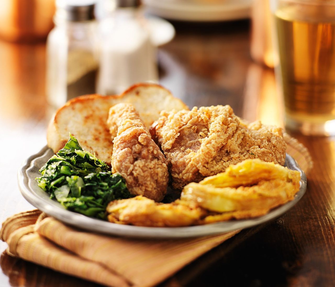 southern-soul-food-with-fried-chicken-and-collard-royalty-free-image-498272540-1550241756.jpg