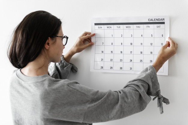 woman-checking-calendar_53876-13451.jpg
