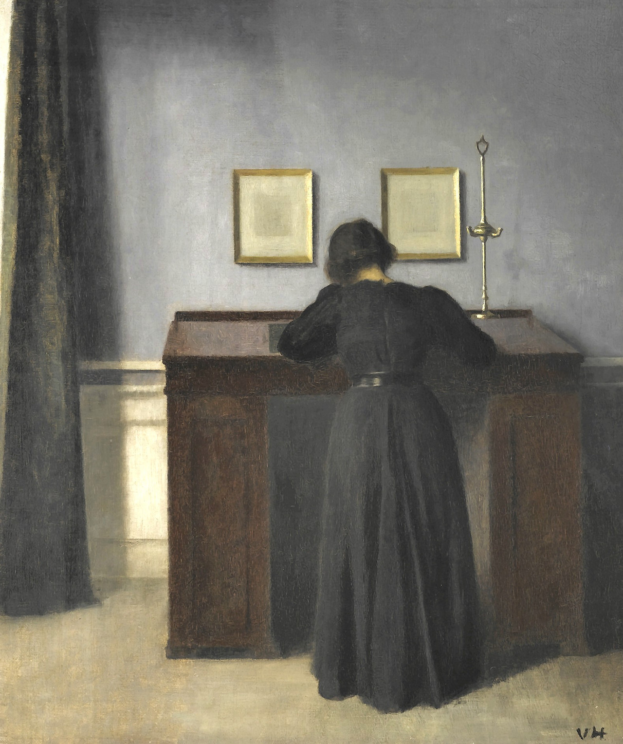 hammershoi-vilhelm---ida-standing-at-a-desk_19368343414_o.jpg