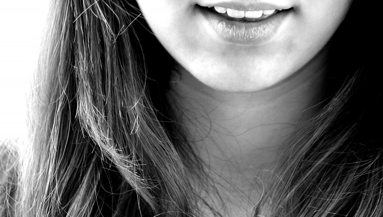 black-and-white-image-of-laughing-teenage-girl.jpg