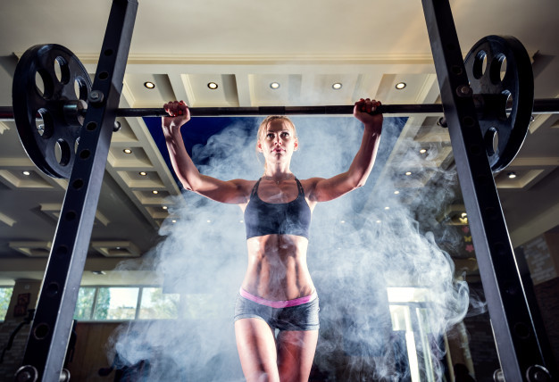 young-sexy-girl-gym-preparing-squat-smoke-background_136403-6872.jpg