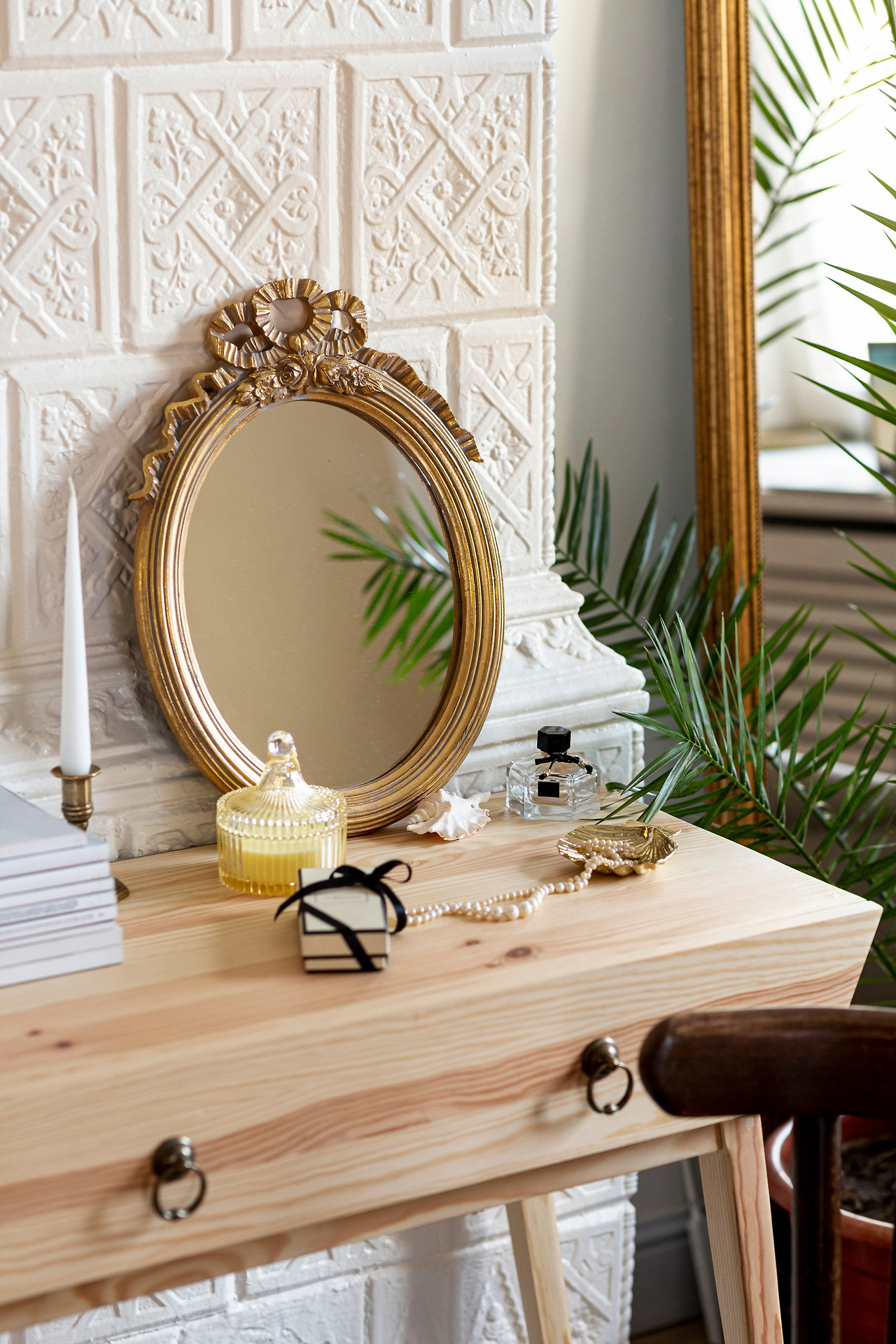 arrangement-with-mirror-perfume-wooden-table.jpg