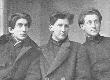 Fondane (left) and F. Brunea-Fox, flanking Iosif Ross. 1915 photograph.jpg