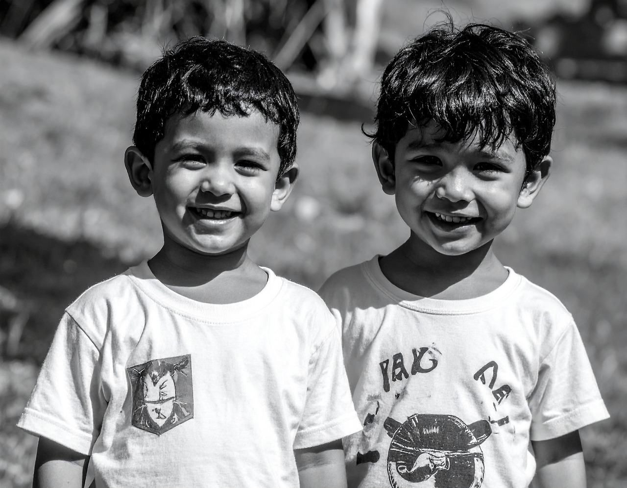 Firefly Children are walking across a black and white screen with smiling faces. 861255 (1).jpg