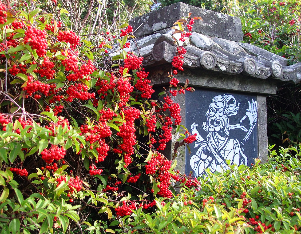 Firefly_On one side of an old stone pagoda is a mural depicting a demon tied to a wall with b 83963.jpg