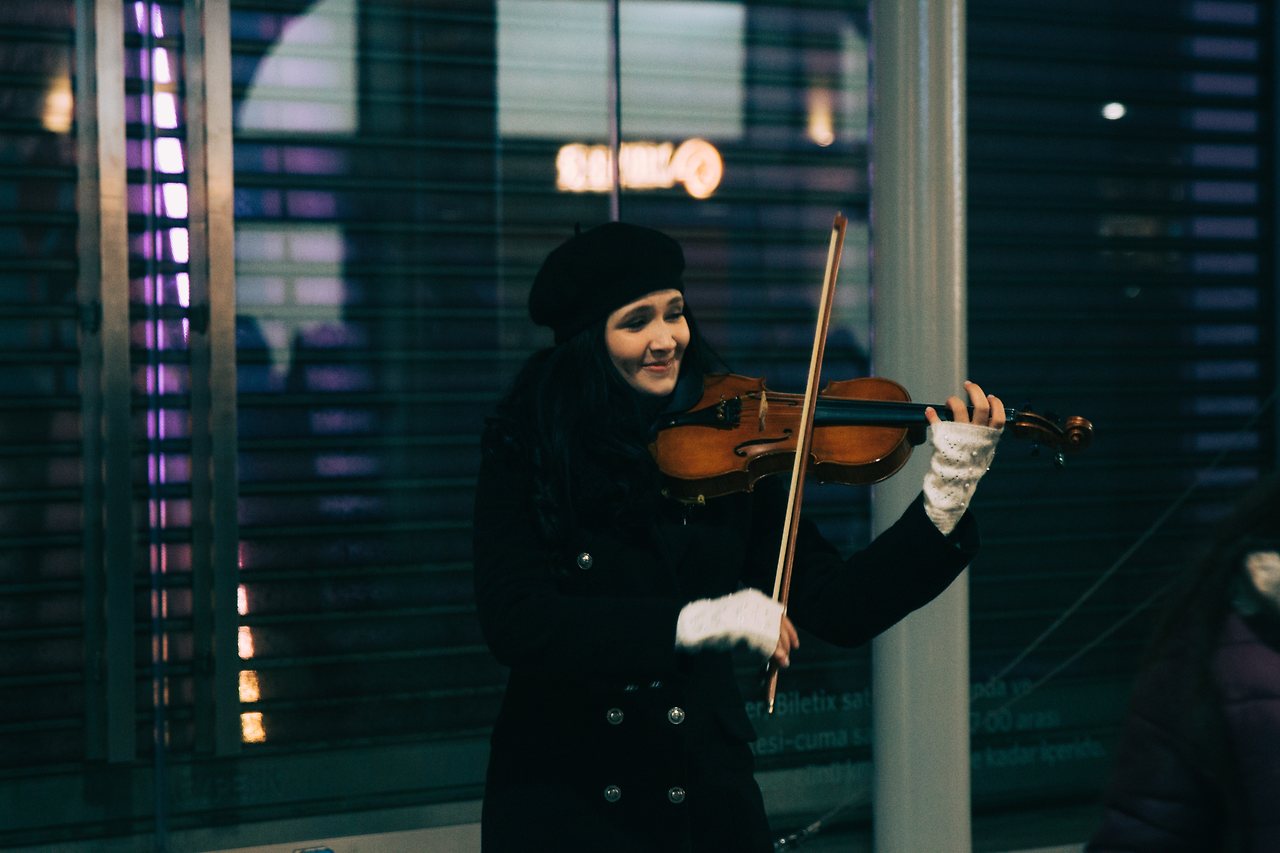 woman-in-black-coat-playing-violin-4212861.jpg