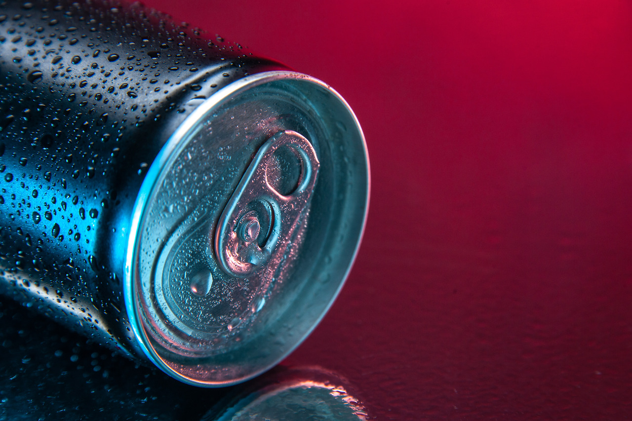 front-view-energy-drink-in-can-on-dark-pink-background-color-water-soda-darkness-drink.jpg