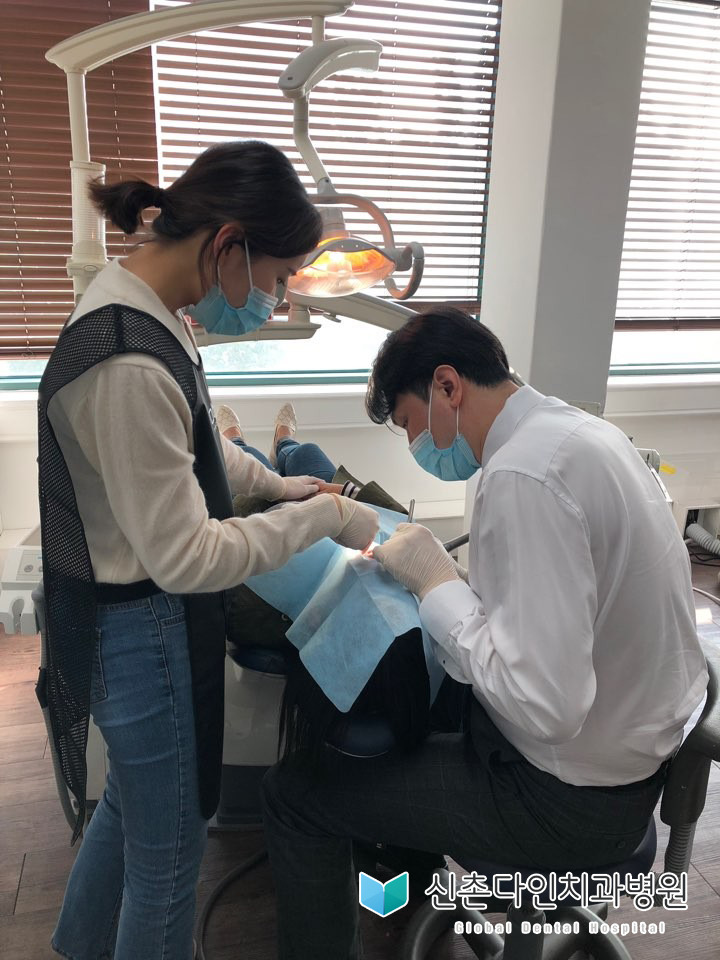 신촌다인치과_함께아시아1.jpg