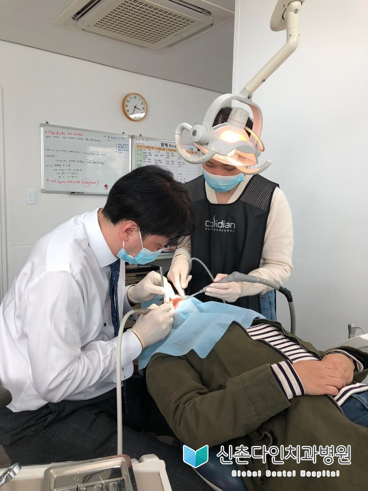 신촌다인치과_함께아시아2.jpg