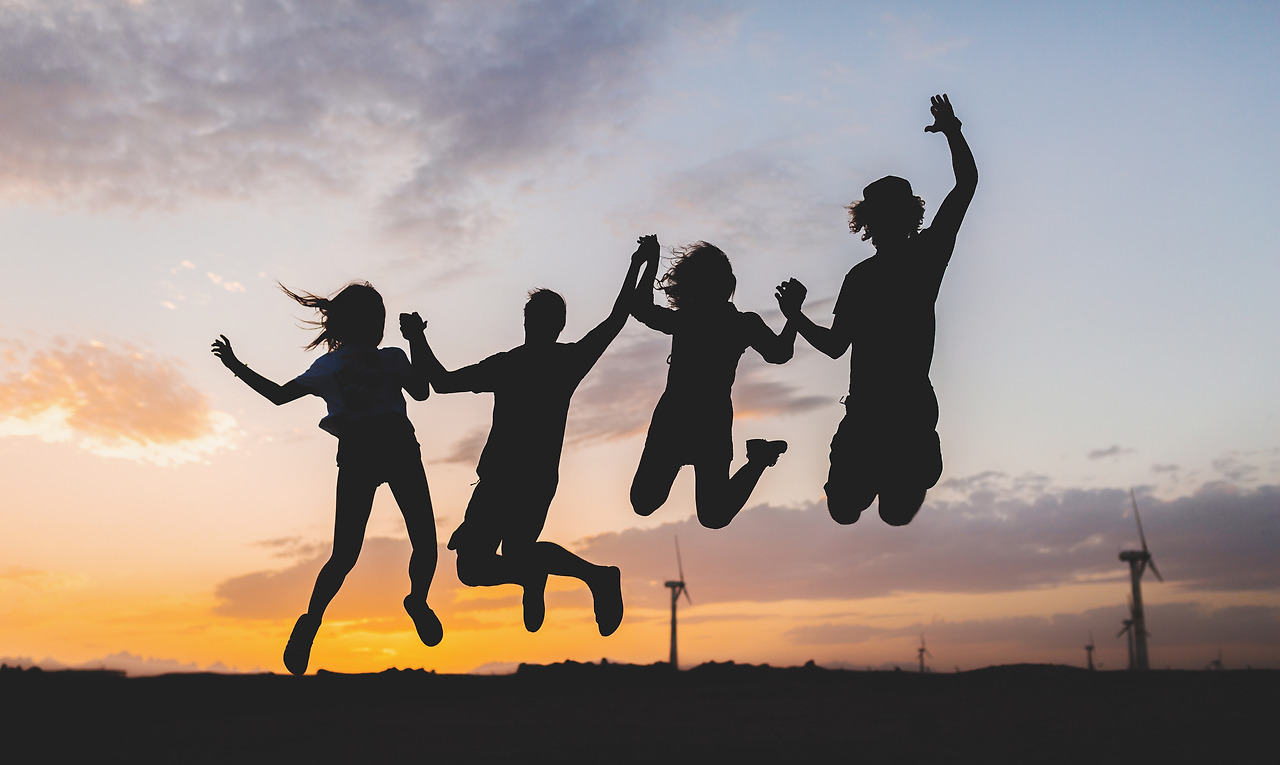 happy-friends-silhouettes-jumping-sunset.jpg