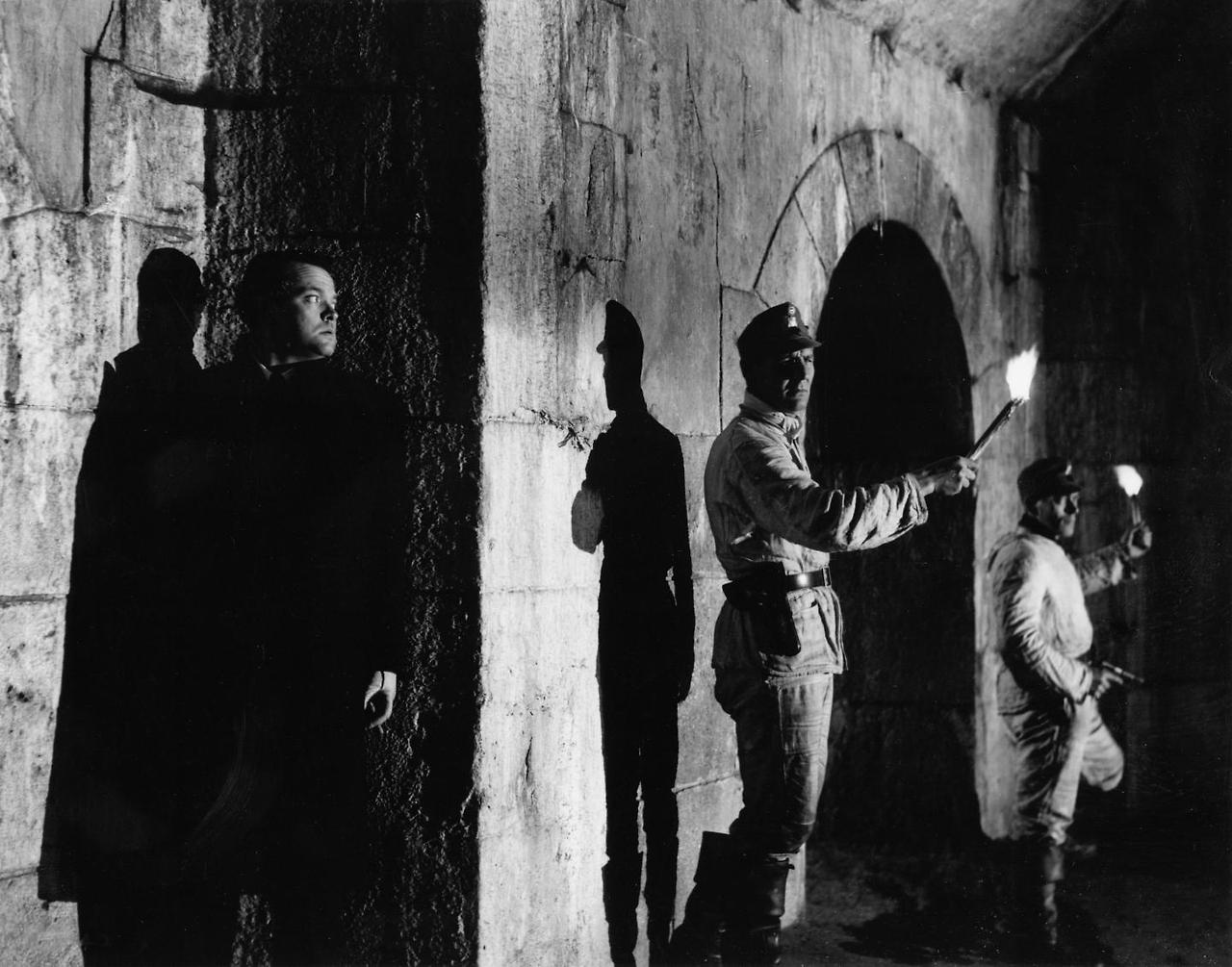 the-third-man-1949-orson-welles-hiding-from-guards-in-shadow.jpg