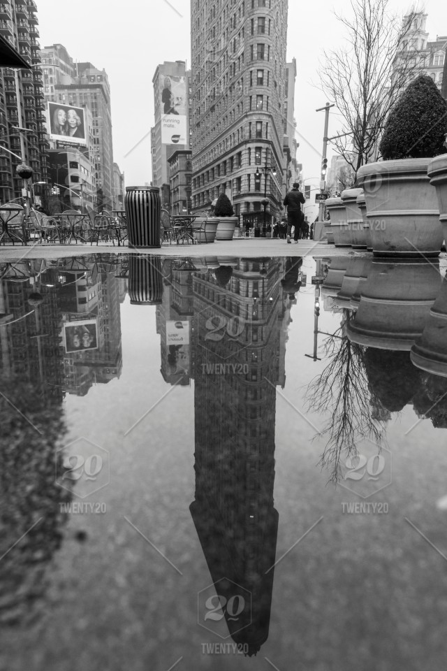 stock-photo-architecture-reflection-black-and-white-landmark-new-york-city-spring-manhattan-puddle-urban-e3262f6b-27f3-48b5-9c31-743d3be78639.jpg