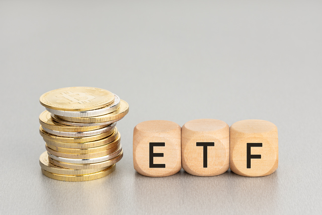 cryptocurrency-etf-concept-stacked-crypto-coins-wooden-blocks-with-text-copy-space.jpg