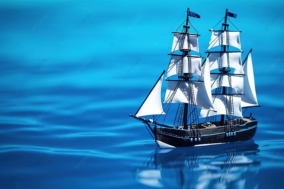 pngtree-a-toy-ship-with-sails-floating-on-water-photo-image_13264600.jpg