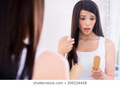 hair-loss-depressed-young-woman-260nw-200124428.jpg