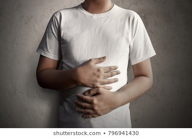 man-holding-stomach-260nw-796941430.jpg
