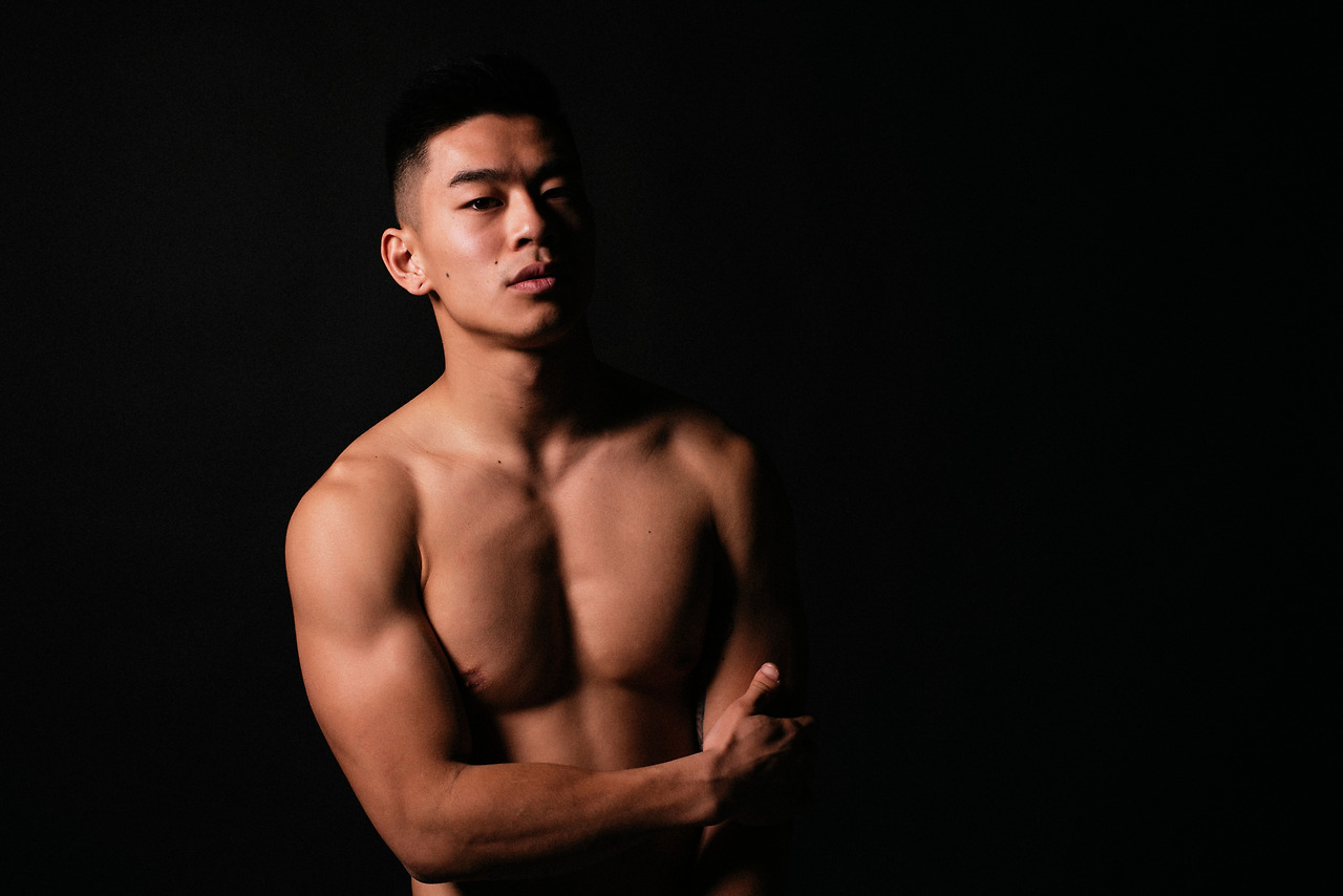 portrait-young-asian-boy-with-fitness-body-challenging-attitude.jpg