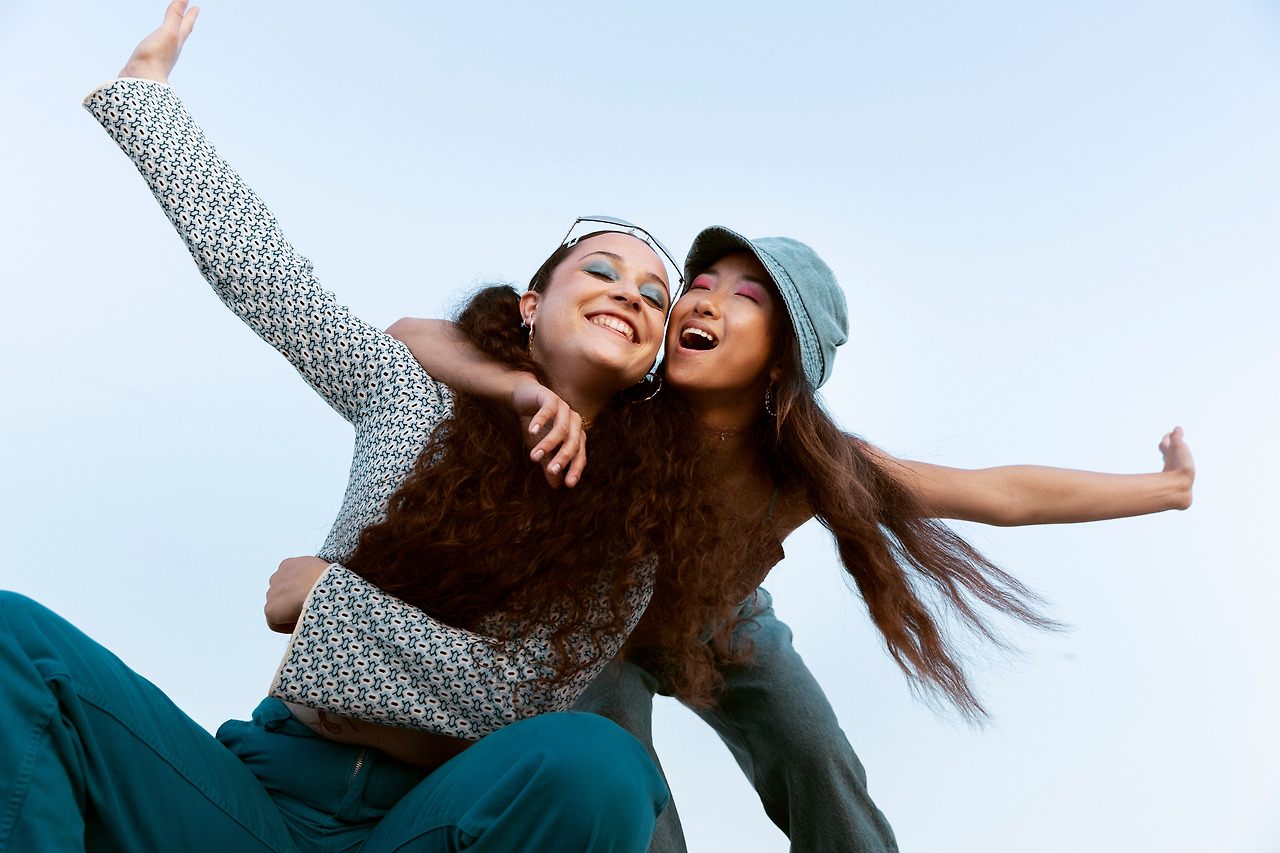 happy-friends-posing-together-low-angle.jpg
