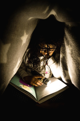 Photo by Anuja Mary Tilj on Unsplash book reading.jpg