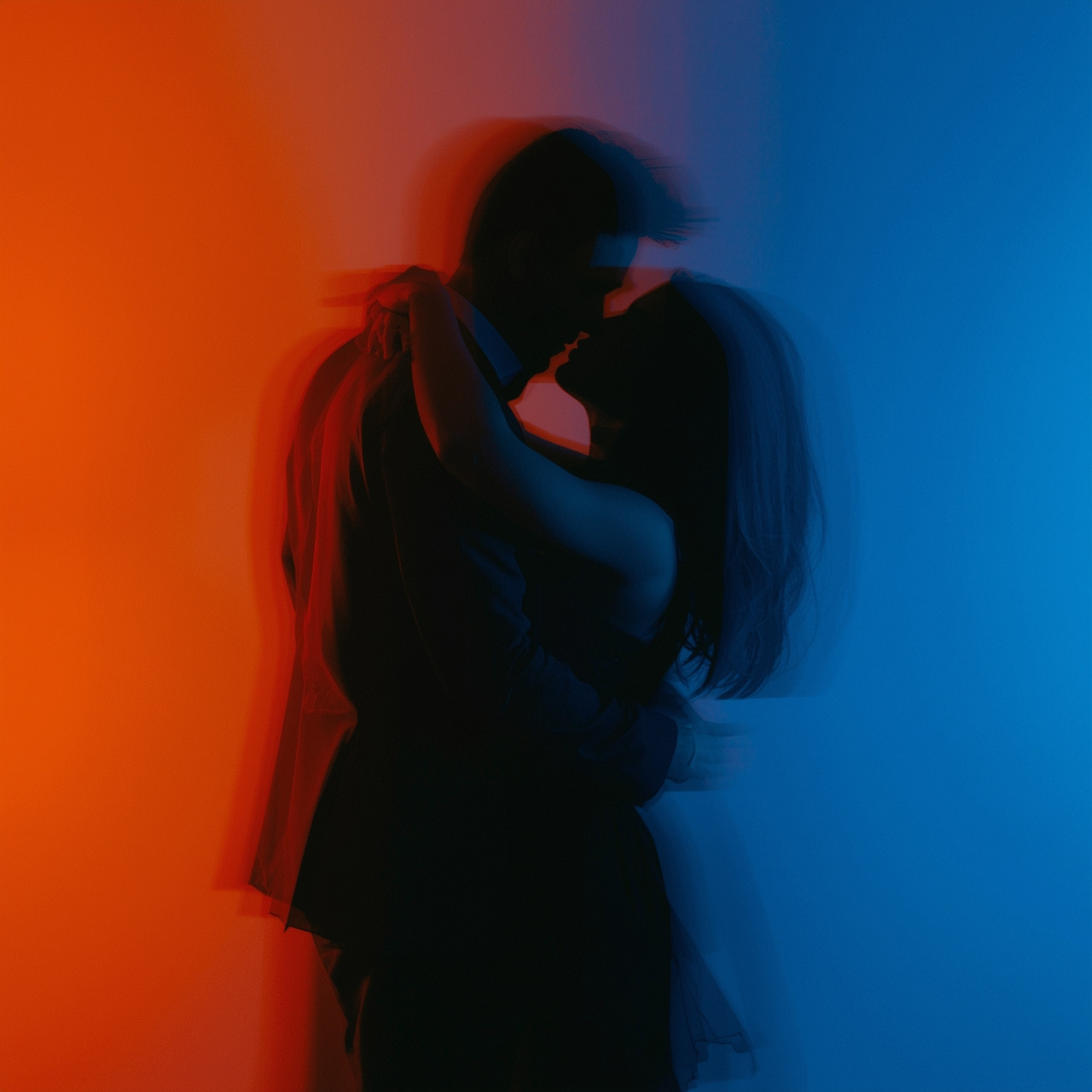 Lucid_Origin_Fineart_color_contrast_tango_couple_halflit_in_wa_1.jpg