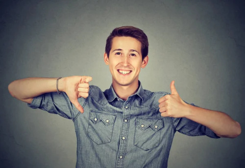 depositphotos_130894002-stock-photo-happy-man-with-thumbs-down.jpg
