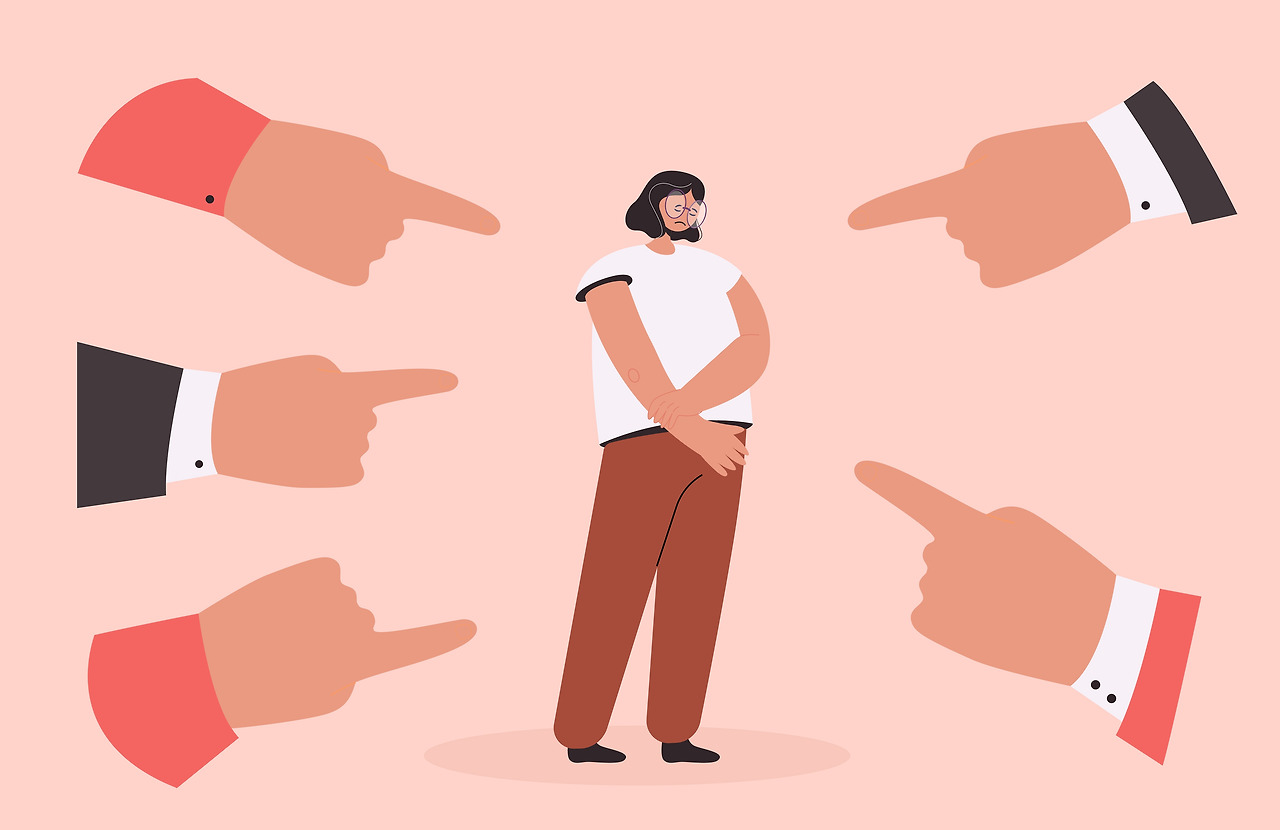 Fingers pointing at sad depressed girl (1).jpg