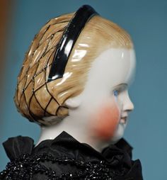 1860snood porcelain doll.jpg