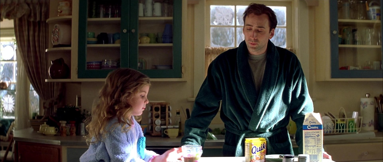 Nestle-Quik-and-Crowley-Milk-Enjoyed-by-Makenzie-Vega-Nicolas-Cage-in-The-Family-Man.jpg
