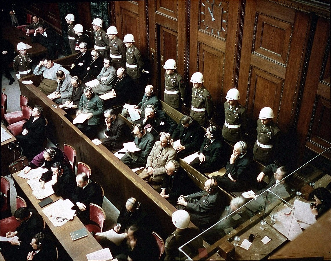 1142px-Defendants_in_the_dock_at_nuremberg_trials.jpg