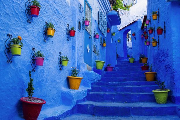 1_Beautiful-street-of-Chefchaouene-town-with-white-and-blue-colors-in-Morocco.jpg