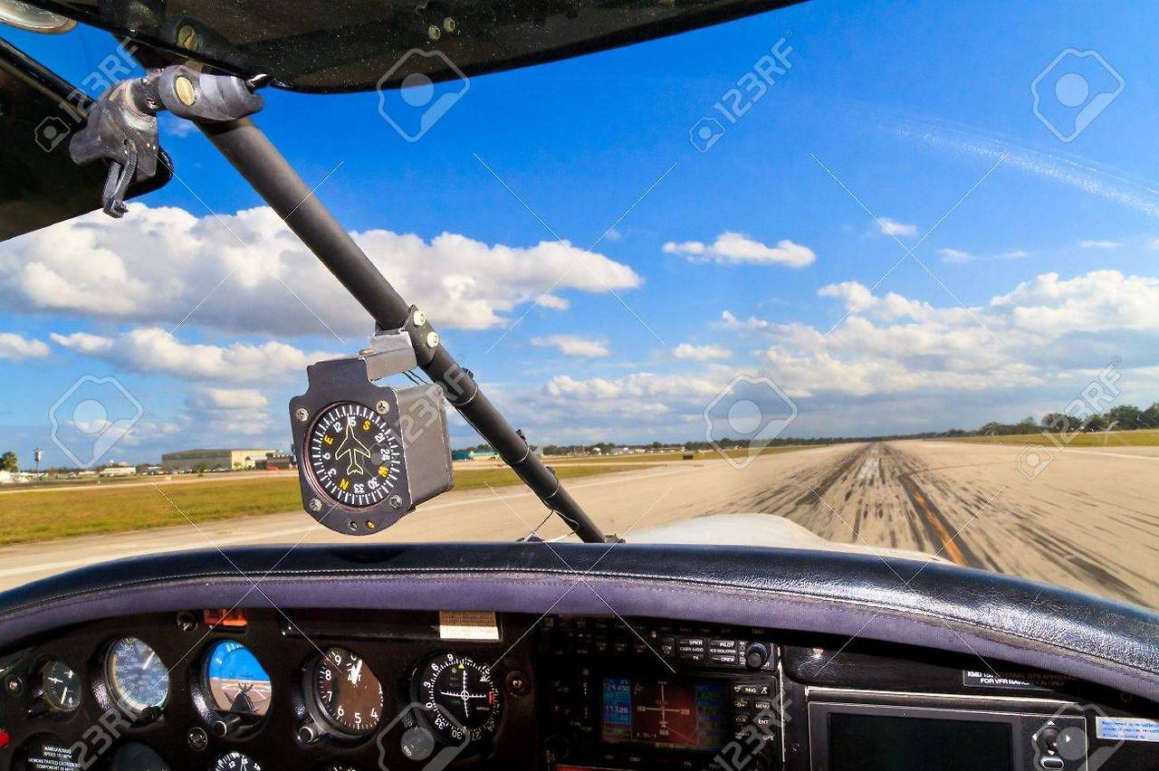 17191574-cockpit-view-from-small-aircraft-taking-off-from-runway.jpg