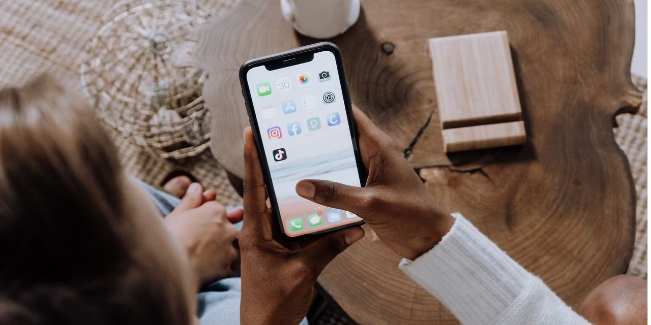 user-holding-phone-tiktok.jpg