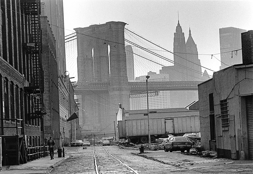 Lower Manhattan skyline and Brooklyn Bridge from Plymouth Street, Dumbo, Brooklyn, 1980.jpg