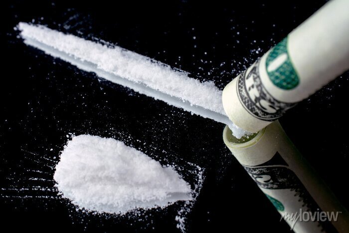 snorting-and-sniffing-cocaine-lines-on-mirror-with-rolled-banknote-drugs-use-and-abuse-of-illegal-substances-with-moody-and-edgy-dark-studio-lighting-close-up-addiction-and-substance-abuse-concept-700-114671812.jpg
