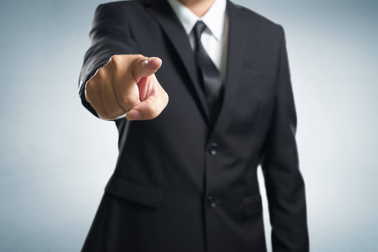 graphicstock-business-man-points-his-finger-at-you-focus-on-hand-blur-out-the-suit_rd0n7nDesl.jpg