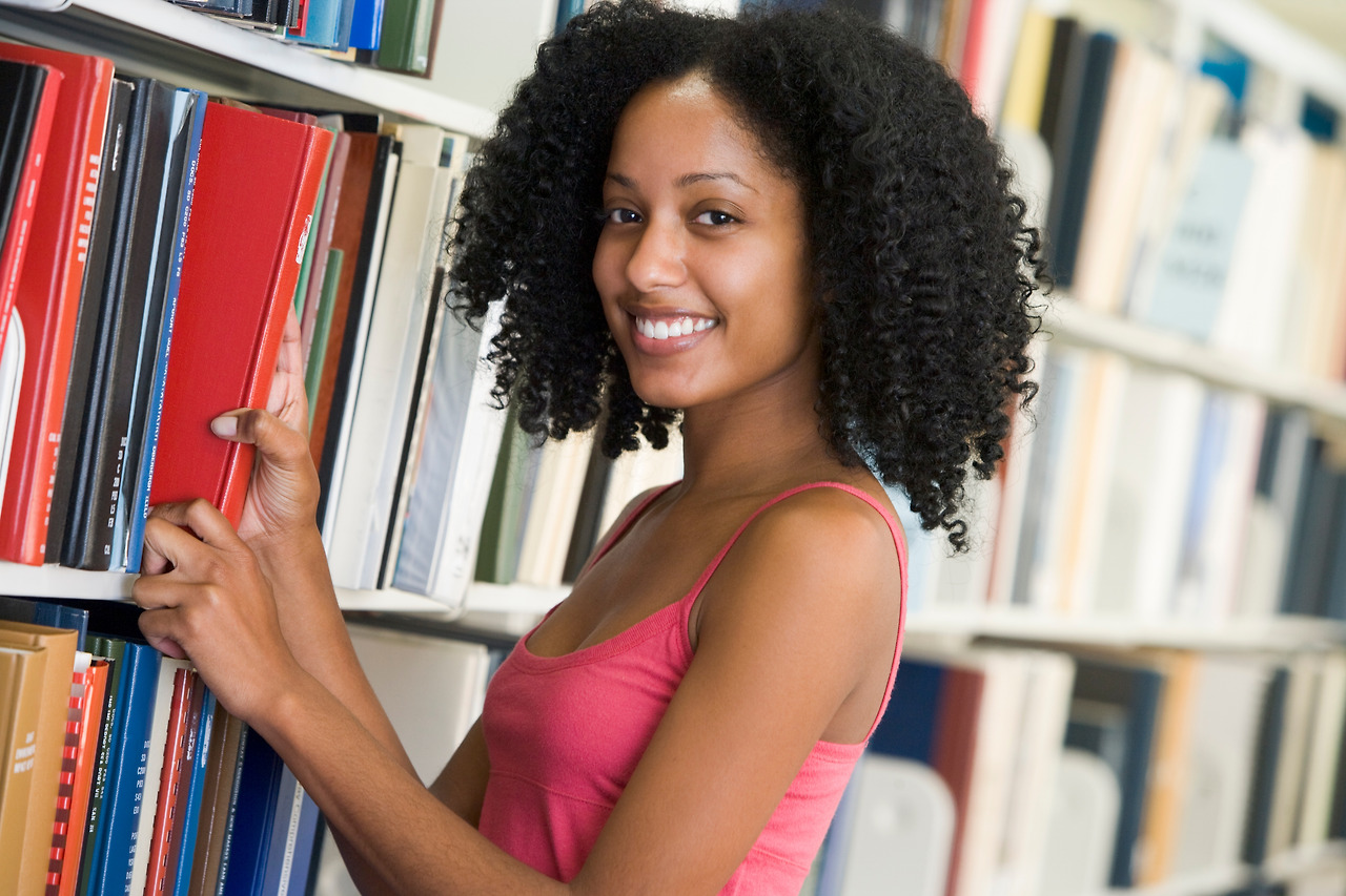female-university-student-selecting-book-from-library-shelf_BFJ-h400rj.jpg
