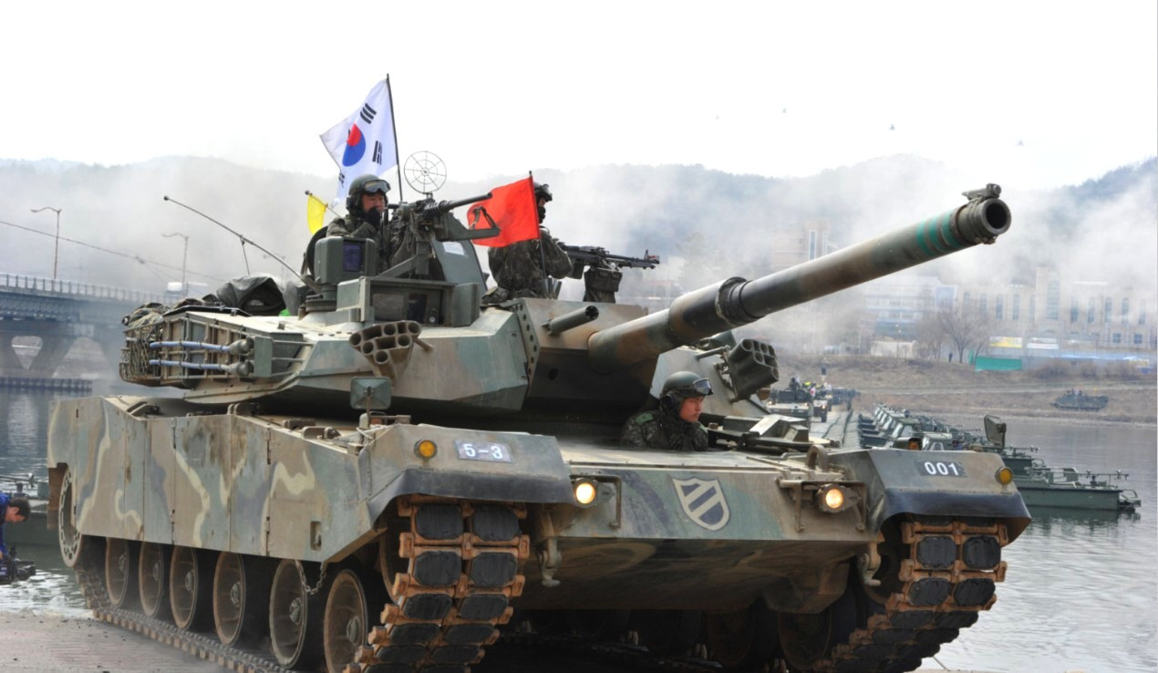 2.outh Korean K-1 tank moves over a temporary bridge during a river-crossing military drill in Hwacheon near the border with North Korea (3).jpg