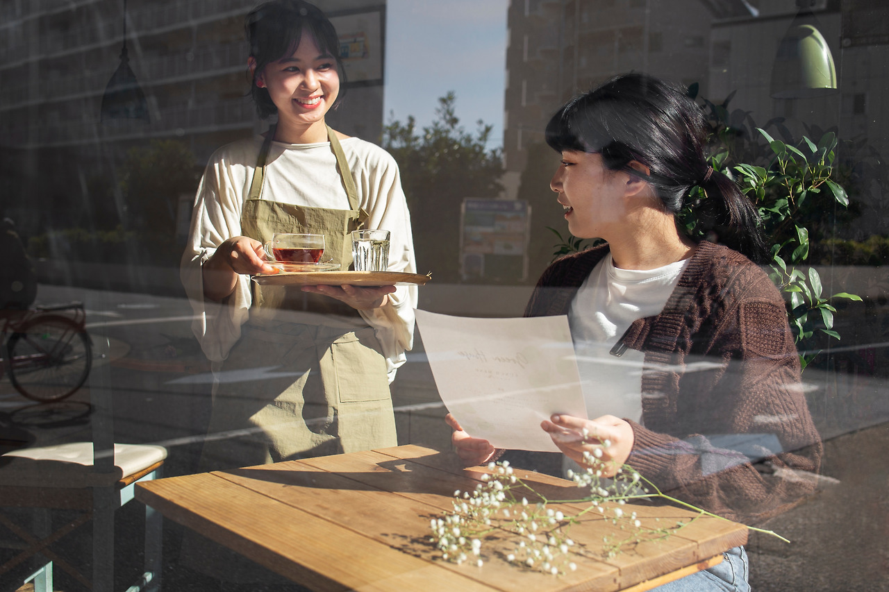 young-women-arranging-their-cake-shop.jpg