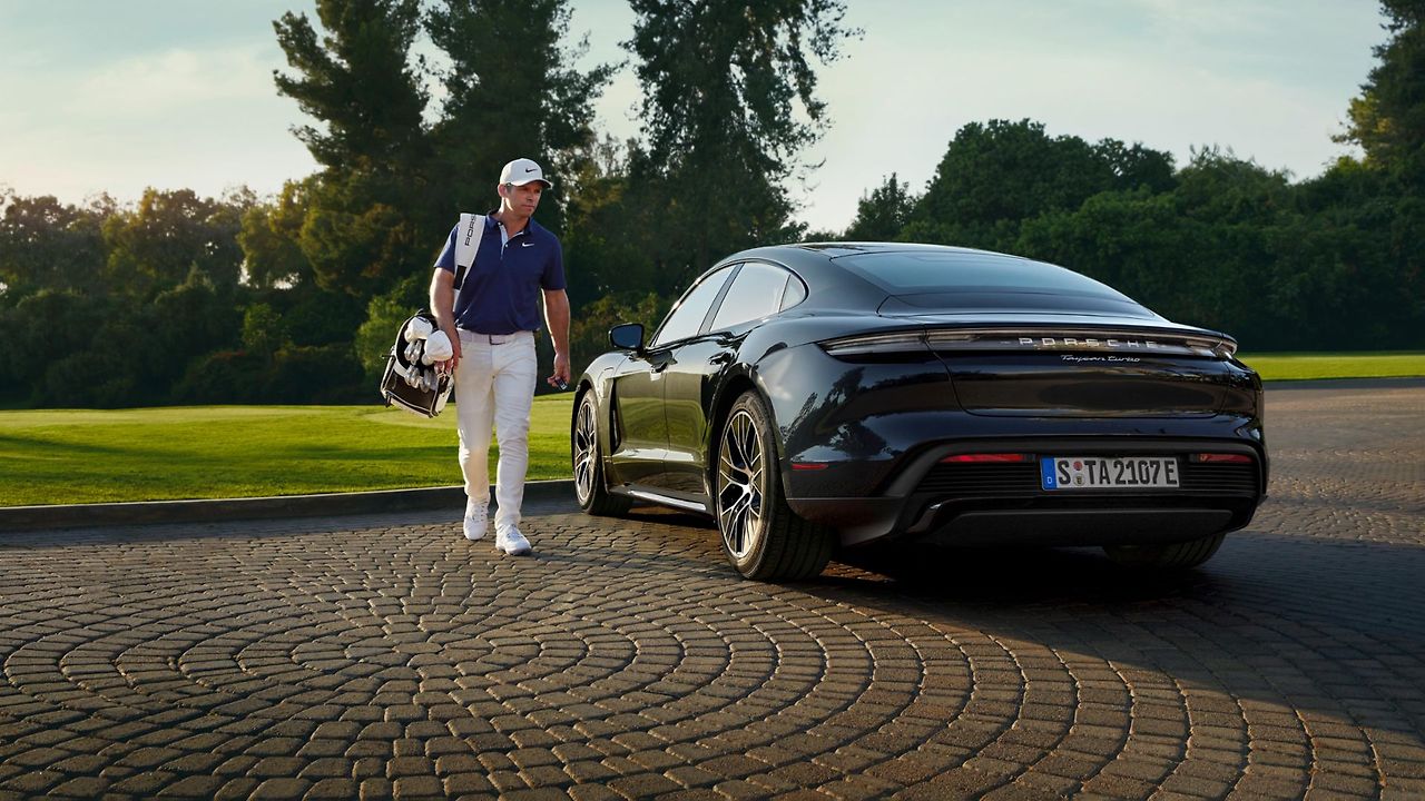 b-Campaign Visual Porsche Golfsport with Porsche Brand Ambassador Paul Casey and the Porsche Taycan Turbo.jpg