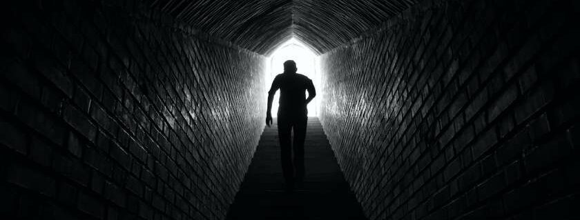 03 silhoutte-of-man-light-at-the-end-of-the-tunnel-e1680058765578.jpg