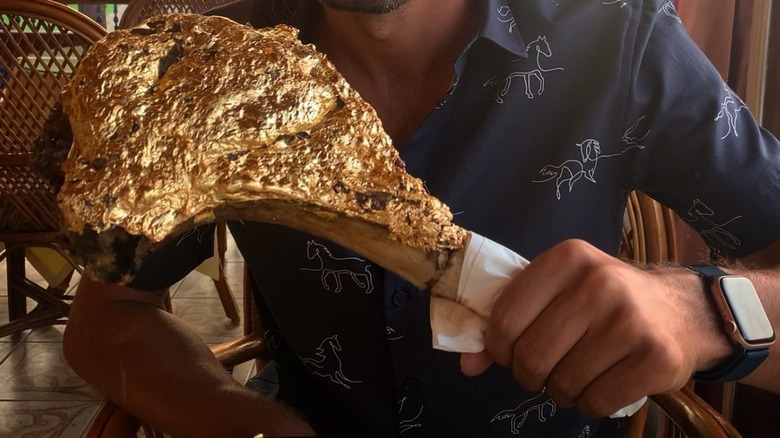 you-can-purchase-a-24-karat-gold-wrapped-tomahawk-steak-1648832710.jpg
