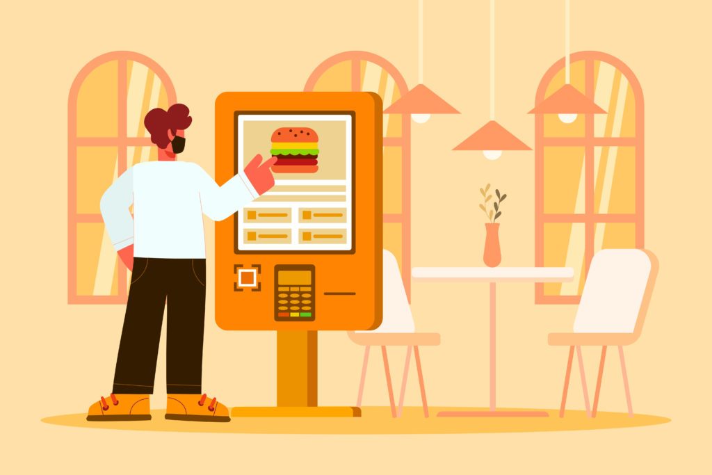 Man-Ordering-Food-Using-Self-Service-Kiosk-1024x683.jpg