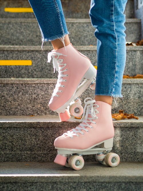 side-view-woman-posing-with-roller-skates.jpg
