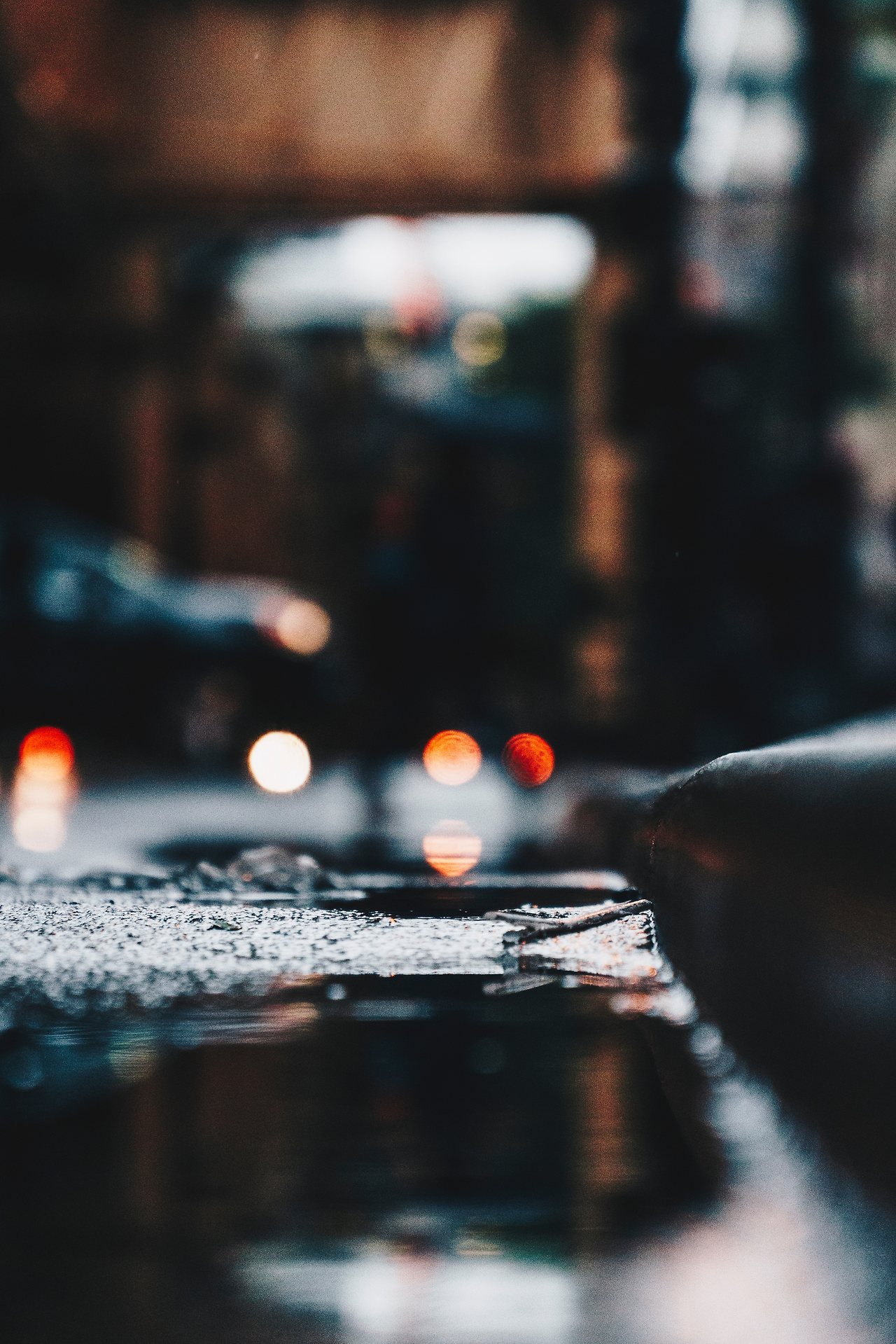close-up-photo-of-wet-sidewalk-2780880.jpg