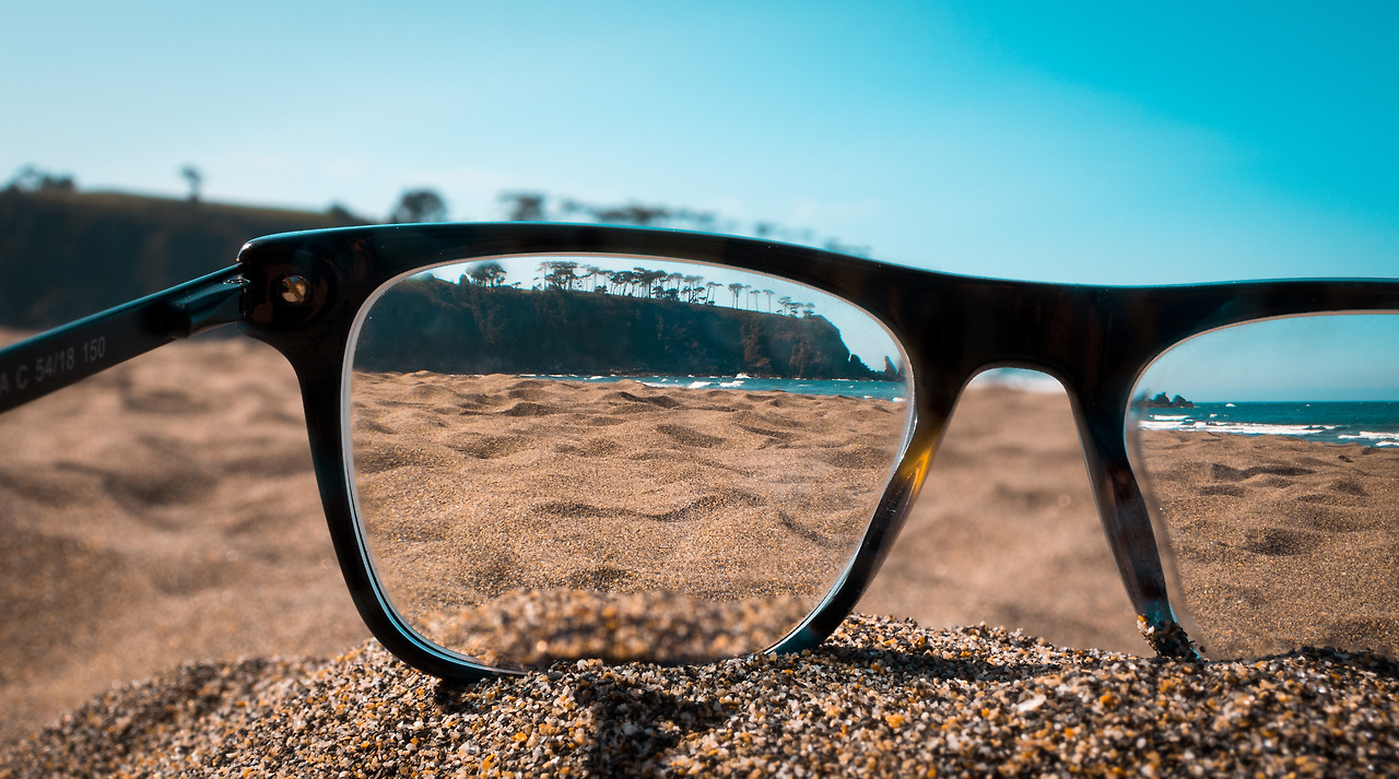closeup-view-beach-viewed-from-lenses-black-glasses.jpg
