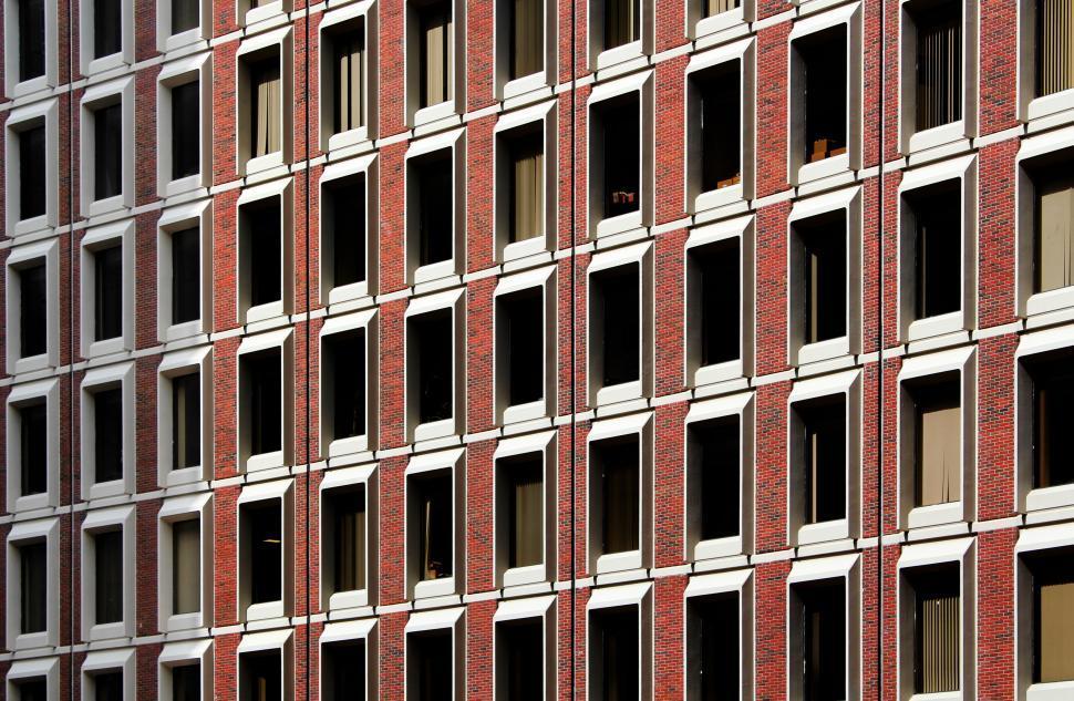 repeating-patterns-of-windows-on-building-facade.jpg